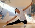 Dragon Estiramiento asana by Margarita Photo Yoga pupil 